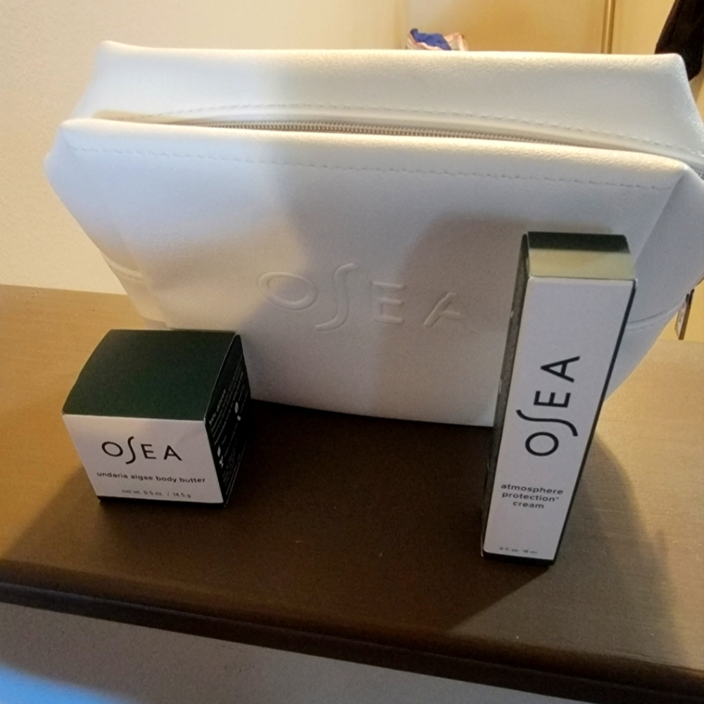 Osea makeup bag with atmospheric cream & body oil